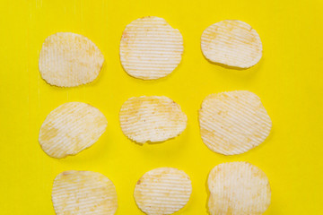 Ridged chips on colorful background