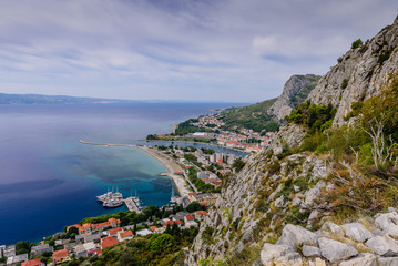 Fototapeta na wymiar Beautiful aerial view of the coastline and the Adriatic sea, Omis town, Dalmatia region, Croatia