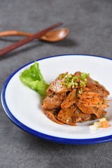 fried chicken with rice and vegetables on plate
