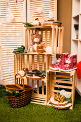 Christmas decoration with a teddy bear, boots and basket