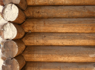 Blockhouse background. Big old timber wall. Retro wooden surface. Horizontal structure. Summer day.