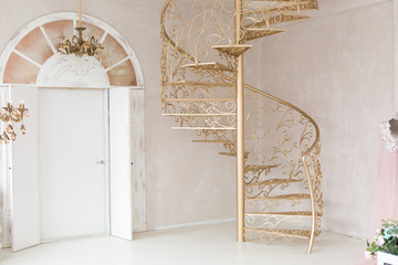 interior with Golden staircase. location in the photo Studio. stairs