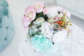 bouquet in the bedroom. bouquet of delicate flowers