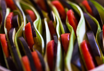 raw Ratatouille - Traditional Dish Of Provencal Cuisine. Healthy Vegetable Food. Wooden Background