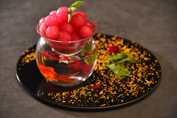 cup of tea with berries