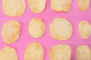 Ridged chips on colorful background