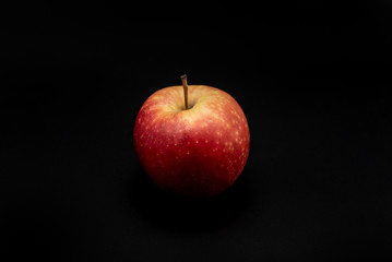 apples on black background