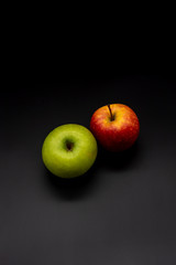 apples on black background