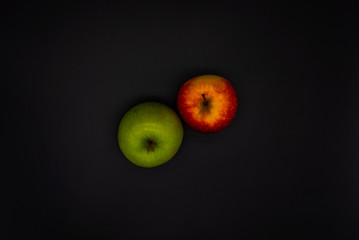 apples on black background