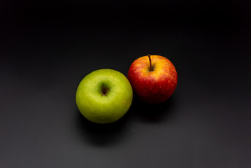 apples on black background