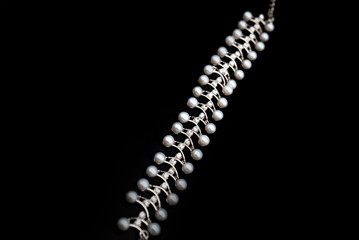 pearl necklace on black