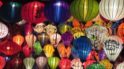 Fototapeta na wymiar Pattern, many bright colorful lampions handmade in Vietnam