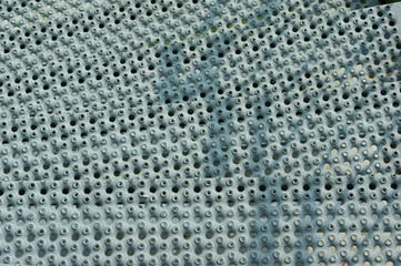 spiral stairway made of galvanised perforated steel plates
