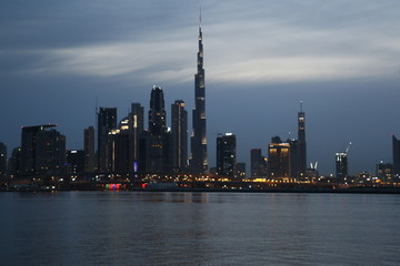 Dubai Skyline under Cloudy Sky, Dubai Downtown Residential and Business Skyscrapers, a view from Dubai Water Canal, Dubai, United Arab Emirates