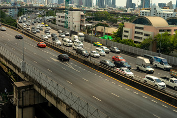 Cityscape and transportation with expressway and traffic in daytime from skyscraper of Bangkok. Bangkok is the capital and the most populous city of Thailand., April 2019