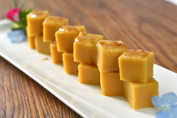 pieces of cheese on wooden table