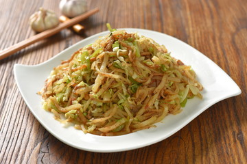 pasta with pesto sauce and basil