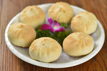dumplings on wooden table
