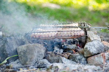 delicious BBQ roasted on charcoal sausages