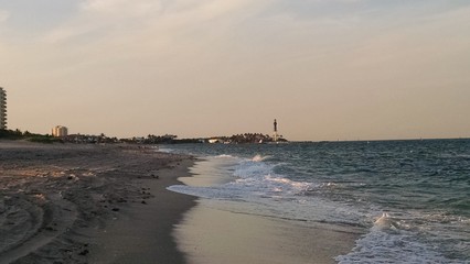POMPANO BEACH, FL/USA – CIRCA MAY 2017 – A lighthouse stands along the shore at Pompano Beach,...