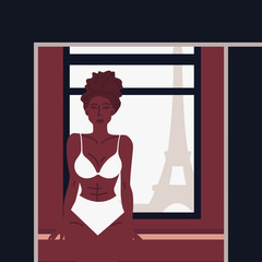 Beautiful adult young woman. Girl stands near the window opening with a view of Paris in hotel room. Beauty vacation travel and tourism concept. Romantic morning in Paris, France. Resting and thinking