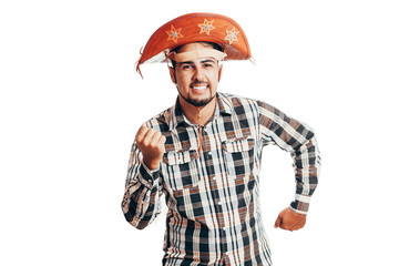 Brazilian man wearing traditional clothes for Festa Junina - June festival - isolated on white background