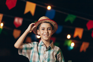 Brazilian boy wearing typical clothes for the Festa Junina - June festival