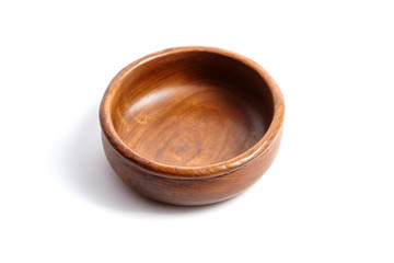 Empty wooden bowl isolated on white background. Round salad-bowl