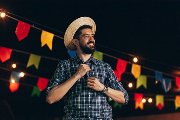 Brazilian man wearing traditional clothes for Festa Junina - June festival