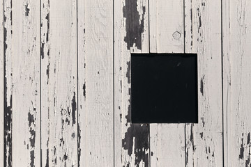 grunge hole in a wood wall