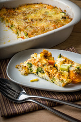 Vegetable gratin with eggs and cheese