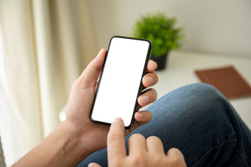 man hands holding phone with isolated screen in the room