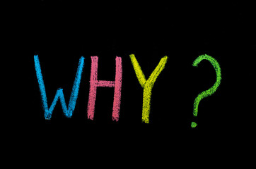 colored question why? on chalkboard