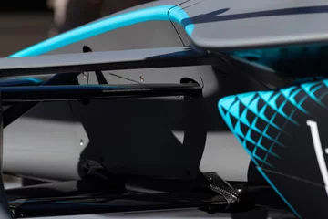 Poster Rome, Italy 2019, March 30th. E-Prix, Formula E. Details of hihg speed electric racing car, carbon and fibreglass textures, blue paint. Extreme sports, design concept, automotive luxury games. © Edward R