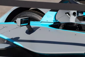 Foto op Canvas Rome, Italy 2019, March 30th. E-Prix, Formula E. Details of hihg speed electric racing car, carbon and fibreglass textures, blue paint. Extreme sports, design concept, small mirror. © Edward R