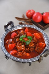beef stew with tomatoes and herbs
