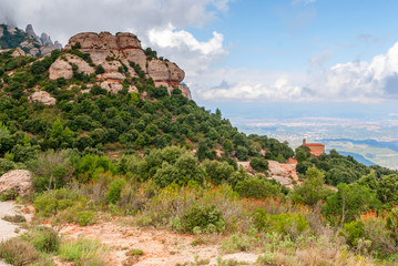 Breathtaking view to Montserrat mountain range on a sunny summer day, Catalonia, Spain