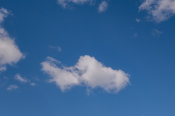 Fototapeta premium Clouds against the blue sky.
