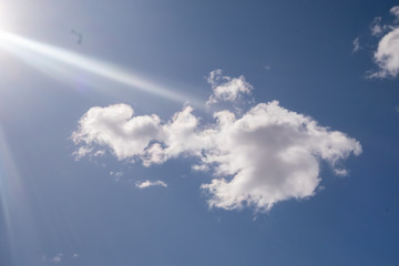 Clouds against the blue sky.