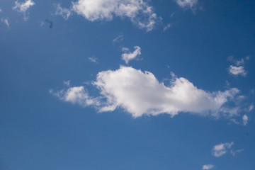 Clouds against the blue sky.