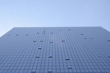 Obraz premium SKYSCRAPER: A lone skycraper in FORT LEE NJ near the George Washington Bridge captivates the sky.