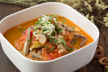 chicken noodle soup with noodles and vegetables