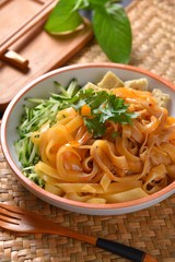 pasta with tomato sauce and basil