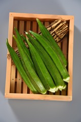 green peas in a bowl on wooden table