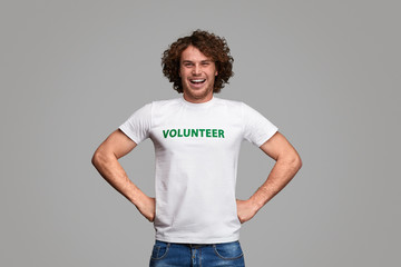 Confident volunteer in hero pose