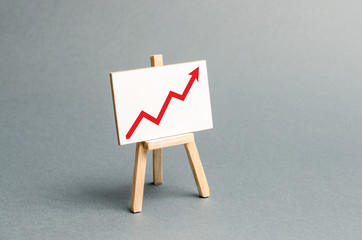 Rack with a red arrow up. Business planning and revenue analysis. Indicators of business projects,...