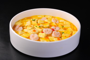 bowl of vegetable soup isolated on white