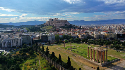 Aerial drone bird's eye view photo of iconic Acropolis hill, the Parthenon and famous theatre of Dionysus, Athens historic centre, Attica, Greece