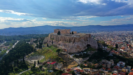 Fototapeta na wymiar Aerial drone bird's eye view photo of iconic Acropolis hill, the Parthenon and famous theatre of Dionysus, Athens historic centre, Attica, Greece