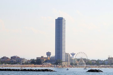 View from the Adriatic sea of  wheel and skyscraper in Cesenatico in Italy